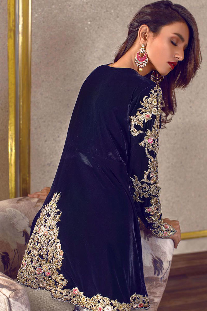 Rozina Munib. Navy blue velvet peplum